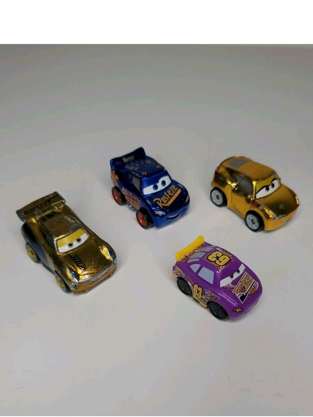 Disney Pixar Cars Mini Racers Lot 4 Gold Metallic Jackson Storm Cruz Ramirez